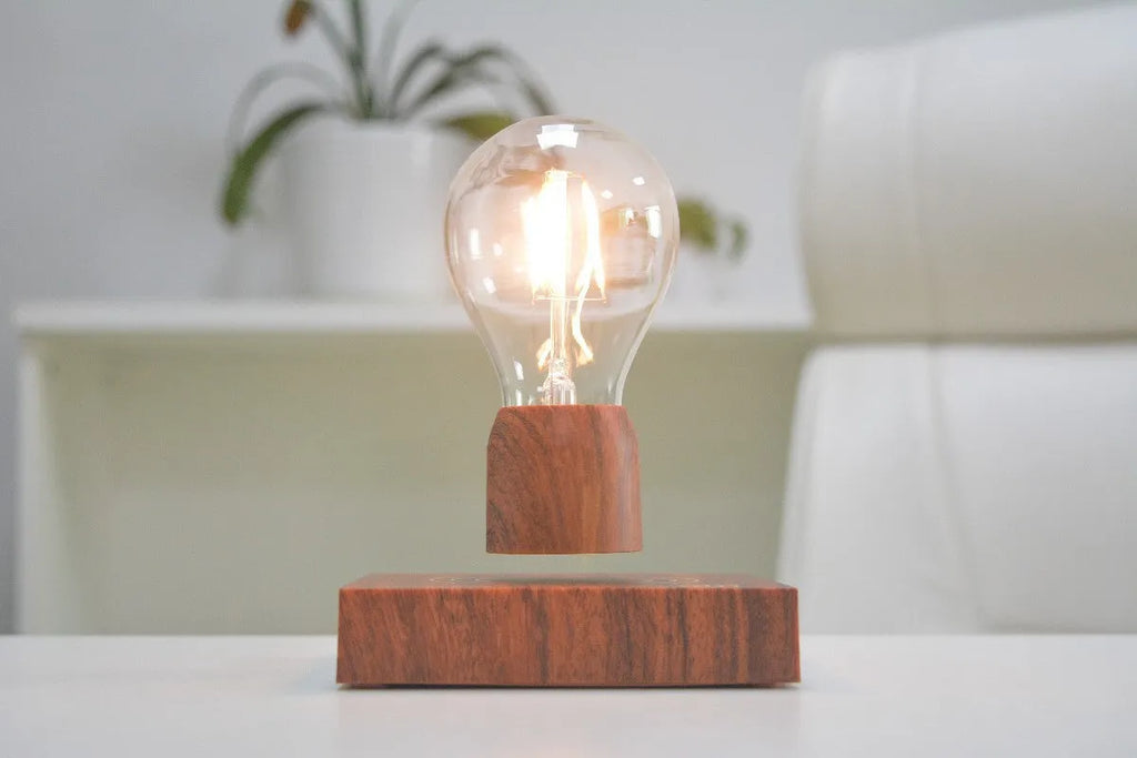 Magnetic levitation bulb floating above imitation wood base with ABS and glass construction, EU CE certified for 100-240V operation