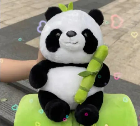 Panda plush doll pillow holding simulated bamboo tube, black and white soft toy