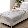 Blue cooling blanket with Japanese Q-Max 0.4 heat-absorbing fibres measuring 180cm wide
