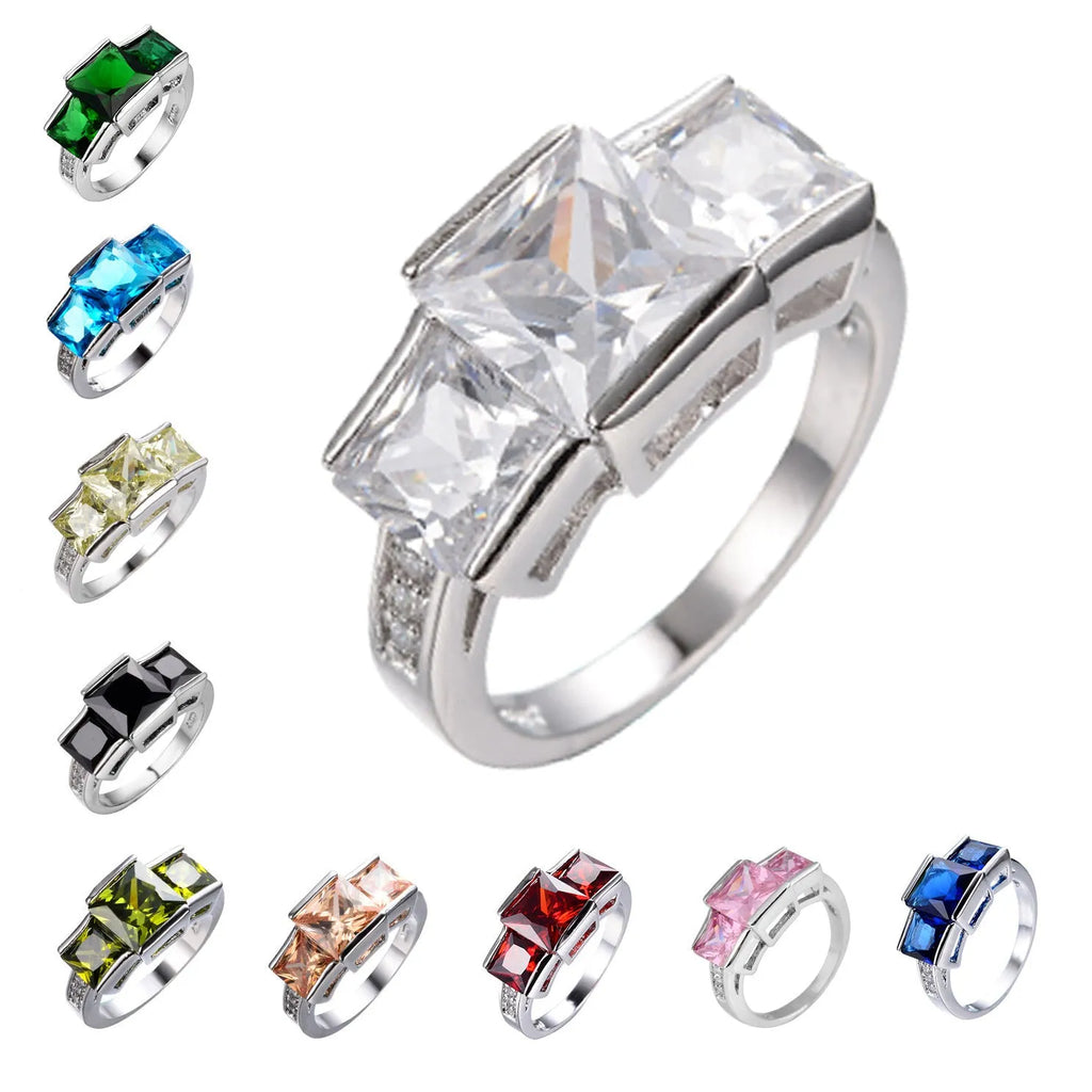 Copper women's ring with geometric design and electroplated colour finish, showing rainbow metal elements