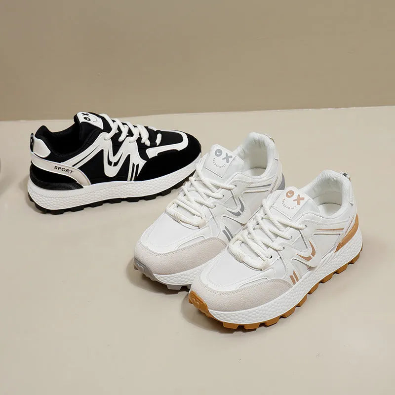 Women's grey casual lace-up shoes with round toe and flat heel on a white background.