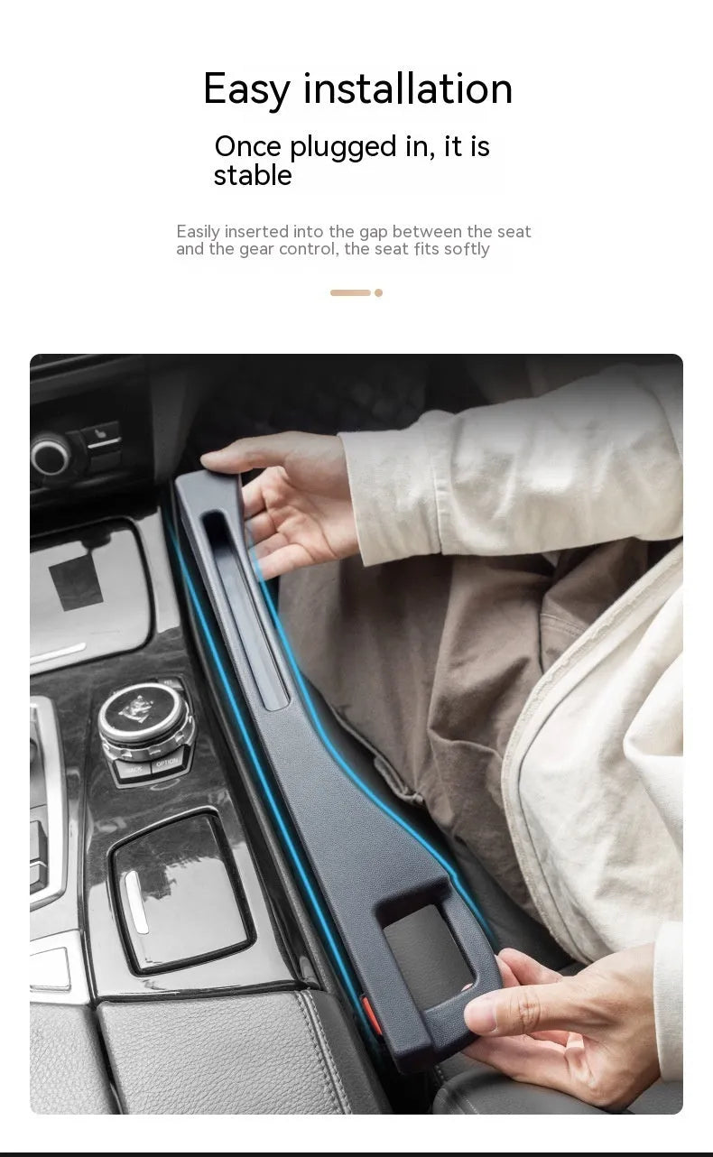 Black plastic storage box with handle placed in car seat gap.