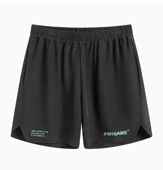 Men's midnight blue training fitness shorts with moisture-wicking fabric on a gym background.