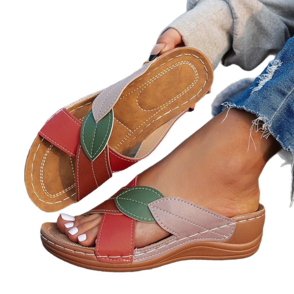 Women's casual slippers with thick soles, cross-strap design, and peep-toe in black, red, and white colours