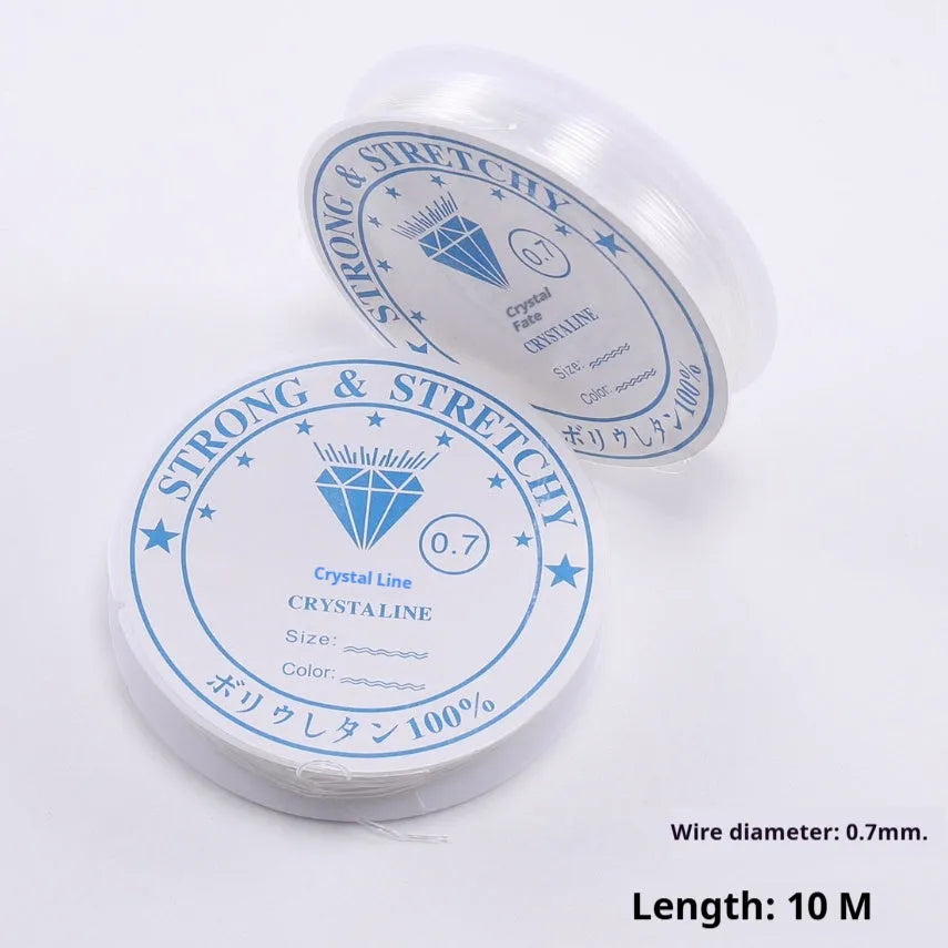Transparent white elastic cord spool for DIY jewellery making, showing crystal-like clarity and diameter options