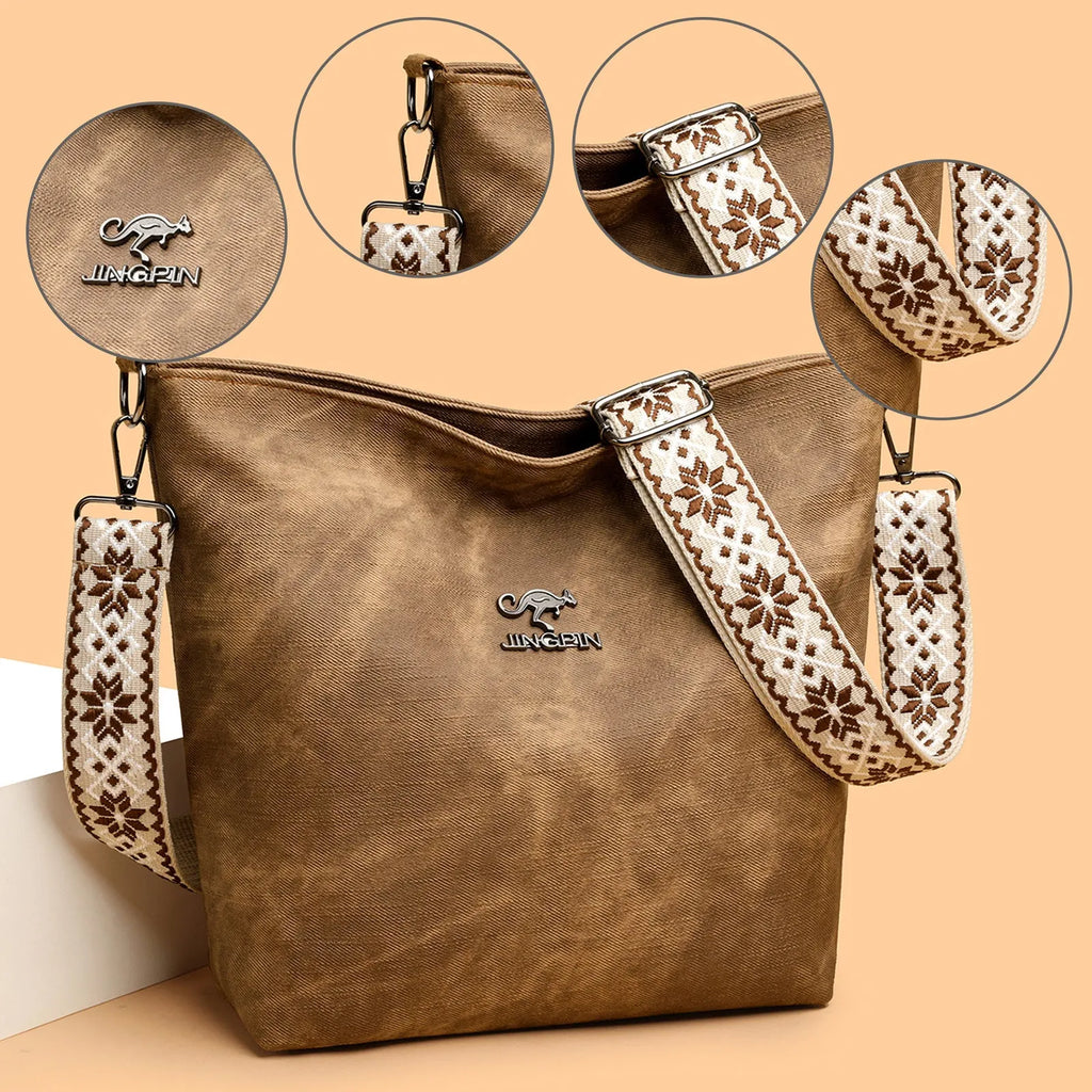 Soft PU large capacity crossbody bag in pink, grey, or yellow with an adjustable shoulder strap.