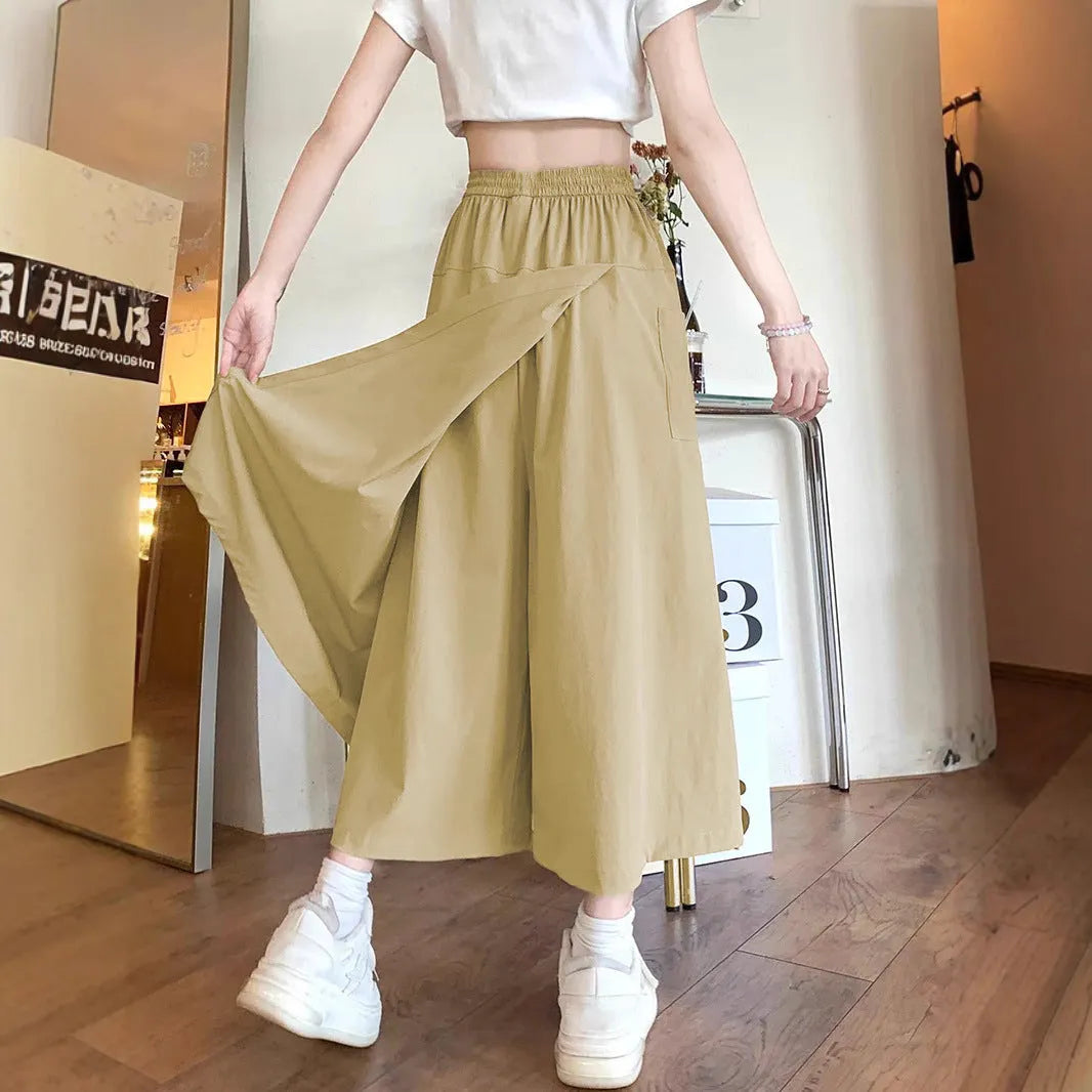 Camel coloured women's wide leg cropped casual skirt with an elastic waistband.