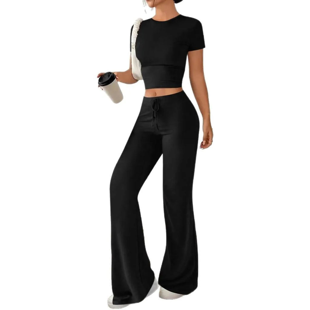 Black high waist trousers and short sleeve t-shirt suit set on a hanger