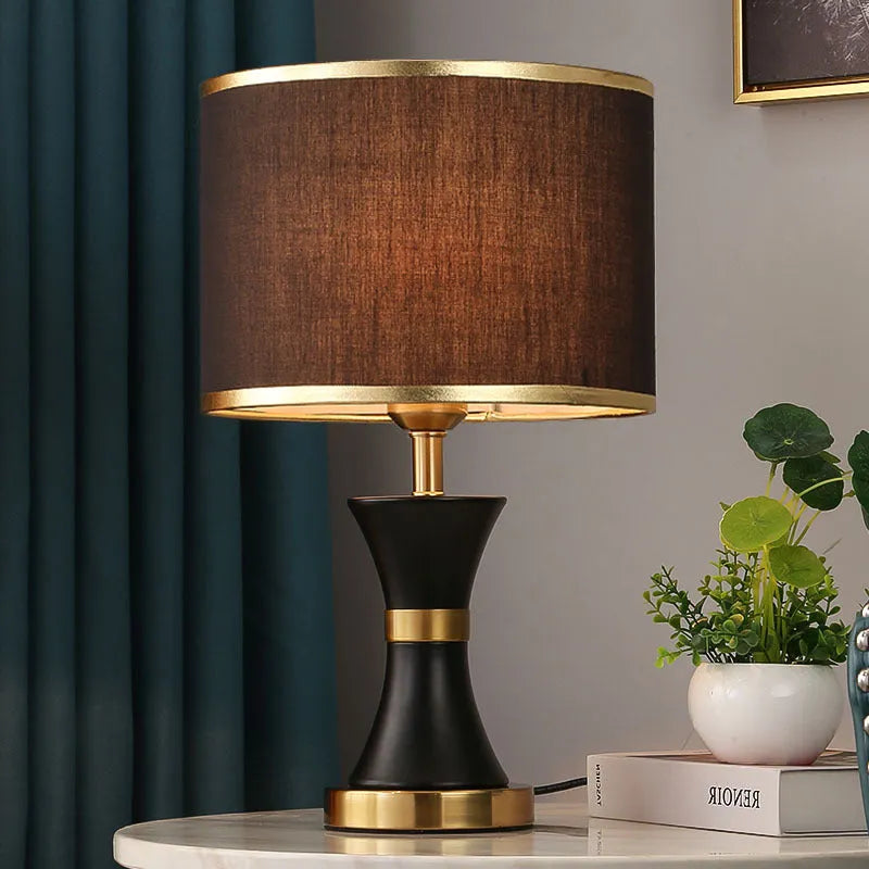 Simple bedroom desk lamp with fabric shade and iron body in black, gold or white finish