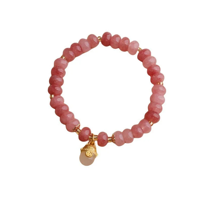 Women's strawberry quartz lucky cat bracelet with animal zodiac charm and retro styling