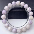 Natural purple turquoise bead bracelet for women on a white background, showing adjustable string tie.