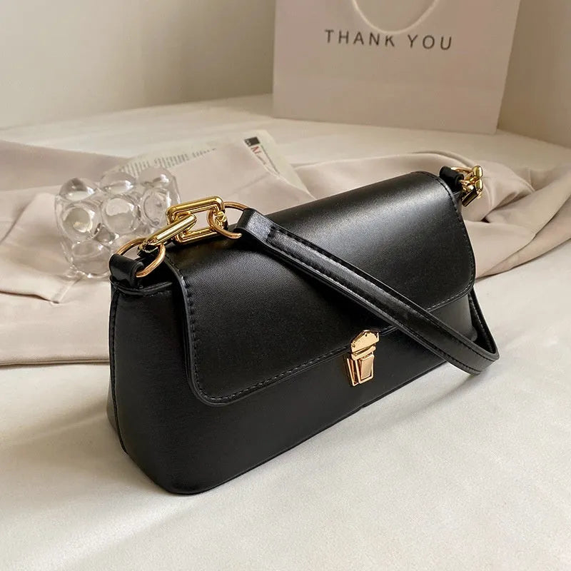 French casual brown PU underarm shoulder bag with chain strap and horizontal square sandwich pocket design.