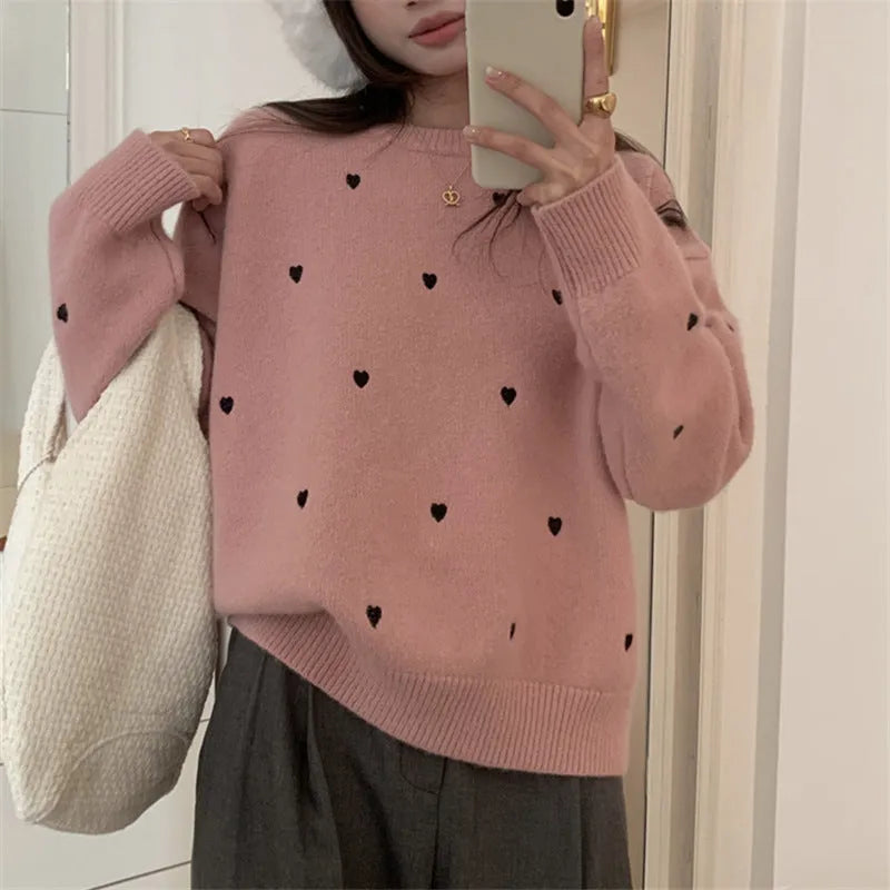 Women's acrylic pullover sweater with embroidery in milky white, loose fit for autumn and winter wear.