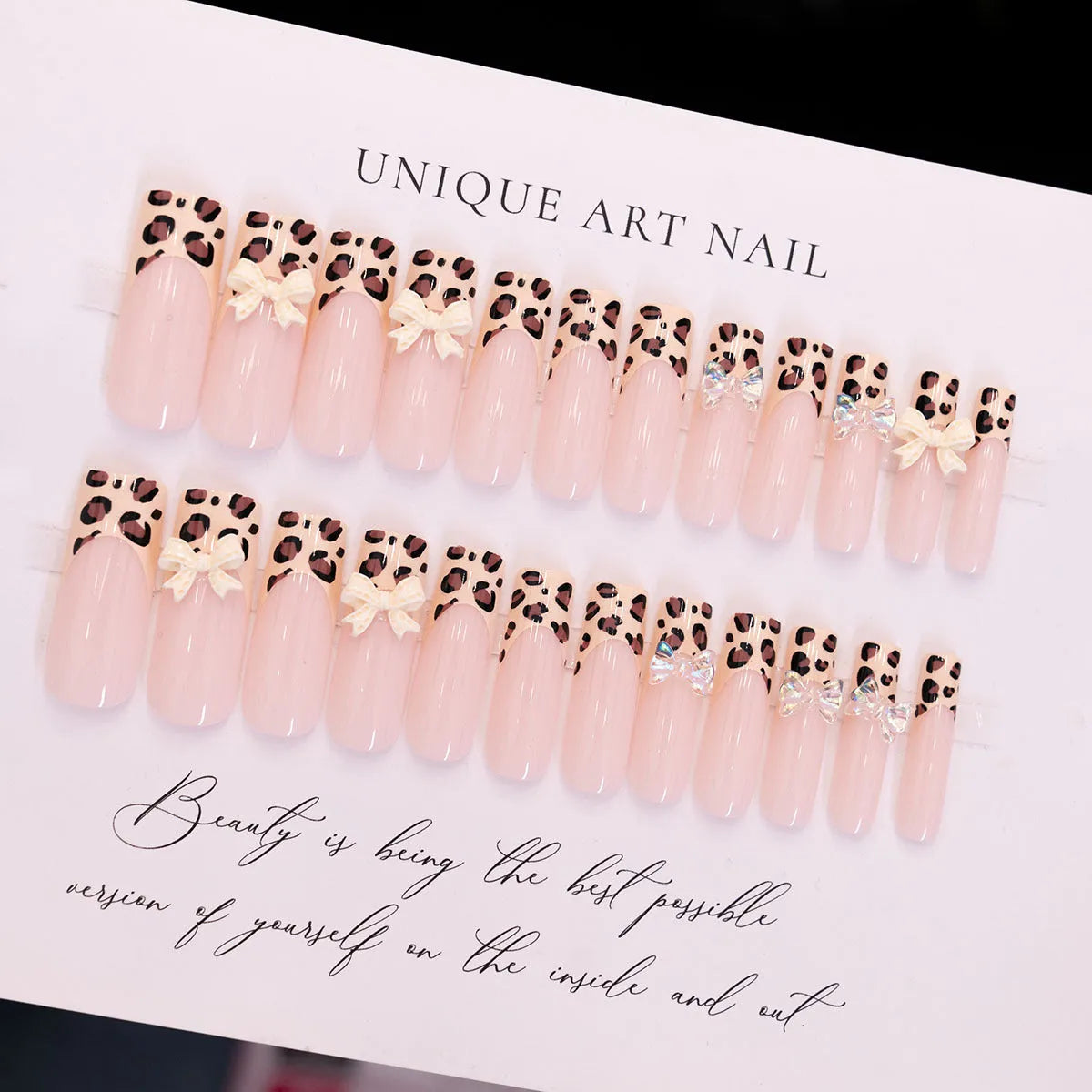 Leopard print butterfly nail art pieces with dimensional plastic construction in WM296 colour pattern