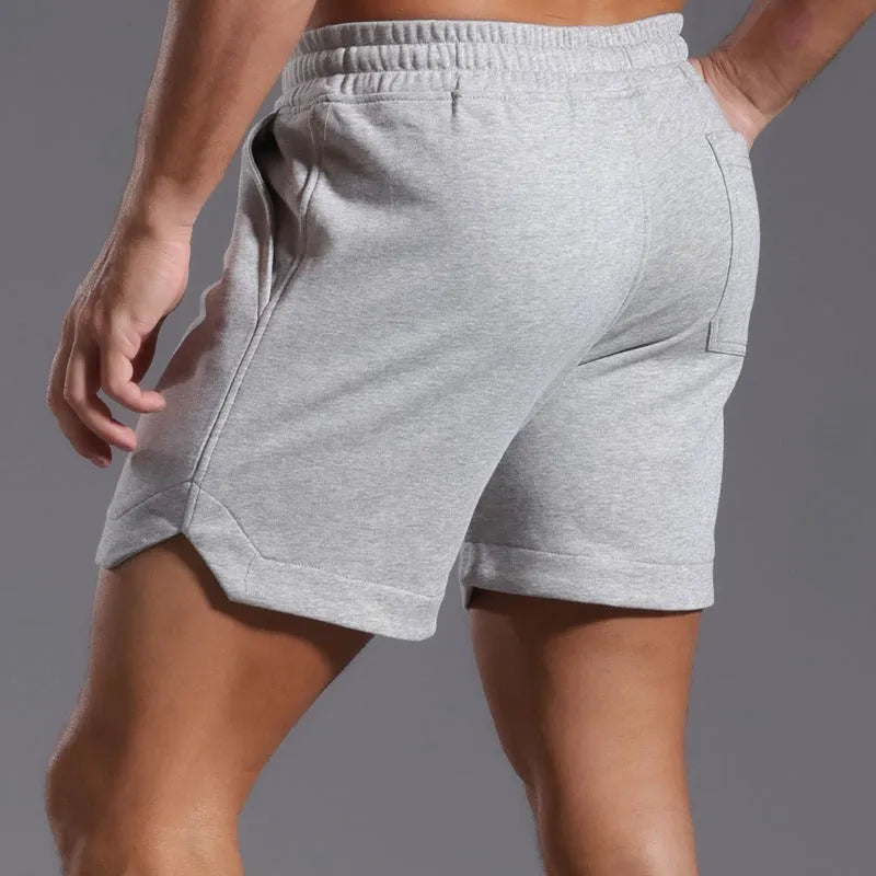 Men's below-the-knee cotton workout running capris in light gray, loose straight mid waist summer shorts