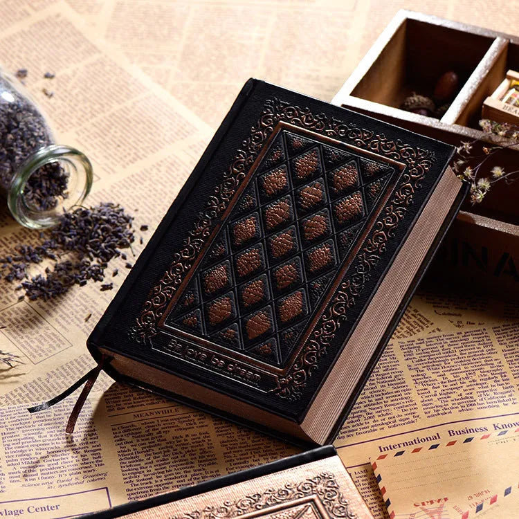 Embossed faux leather notepad with three-dimensional cover design in bronze colour showing 200-page thickness