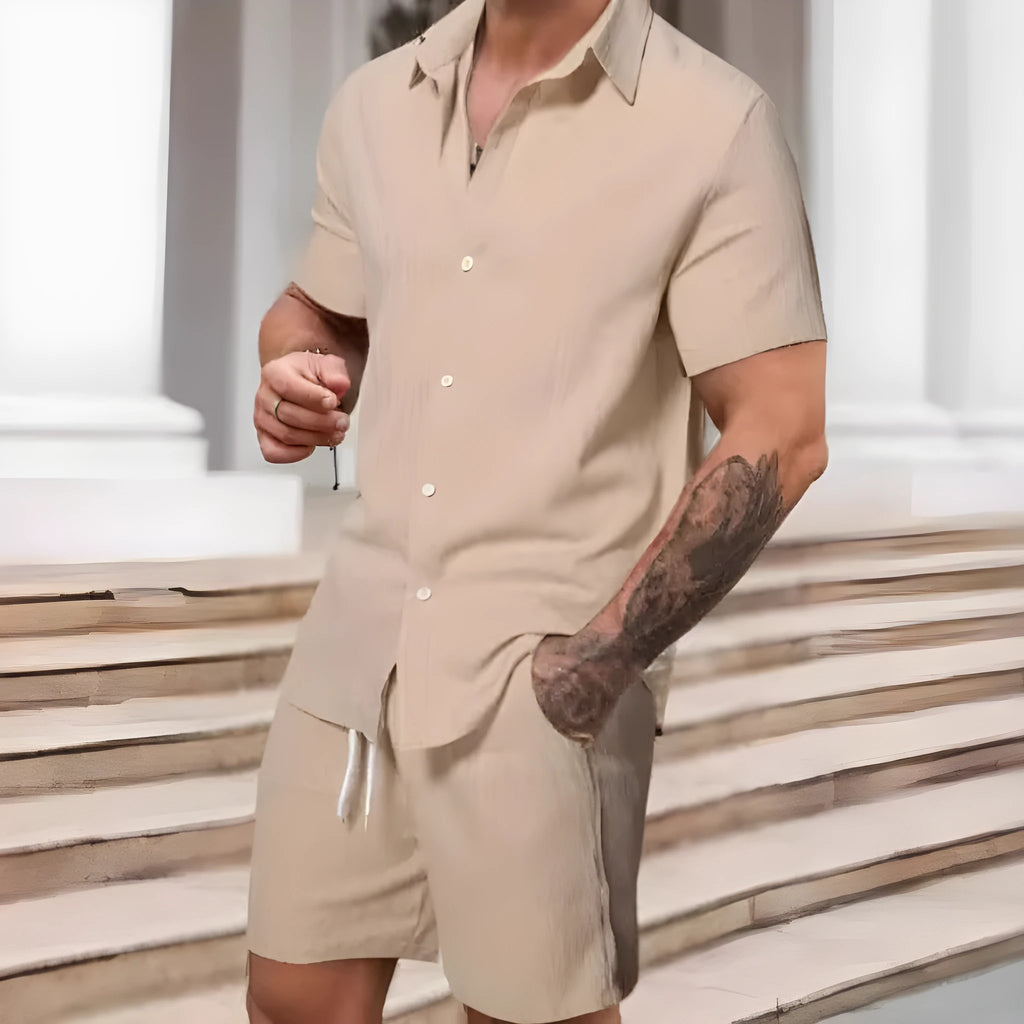 Men's striped printed casual suit set featuring a short sleeve shirt and matching shorts on a hanger.