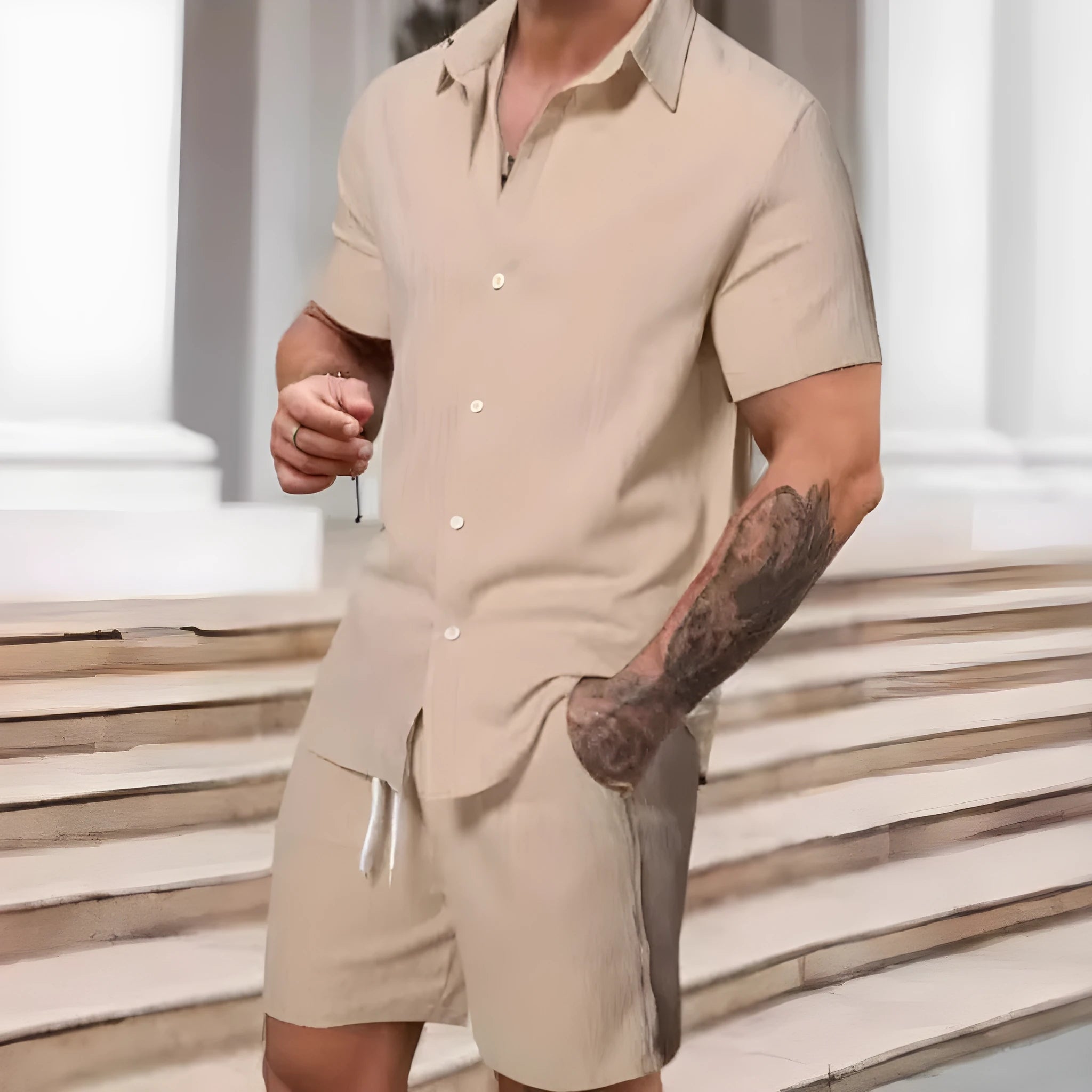 Men's striped printed casual suit set featuring a short sleeve shirt and matching shorts on a hanger.