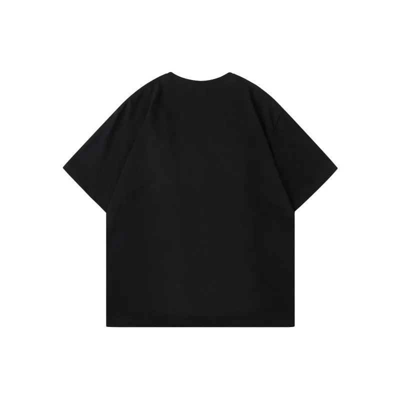 Cotton pullover with patchwork design showing letter patterns in loose fitting short sleeve style