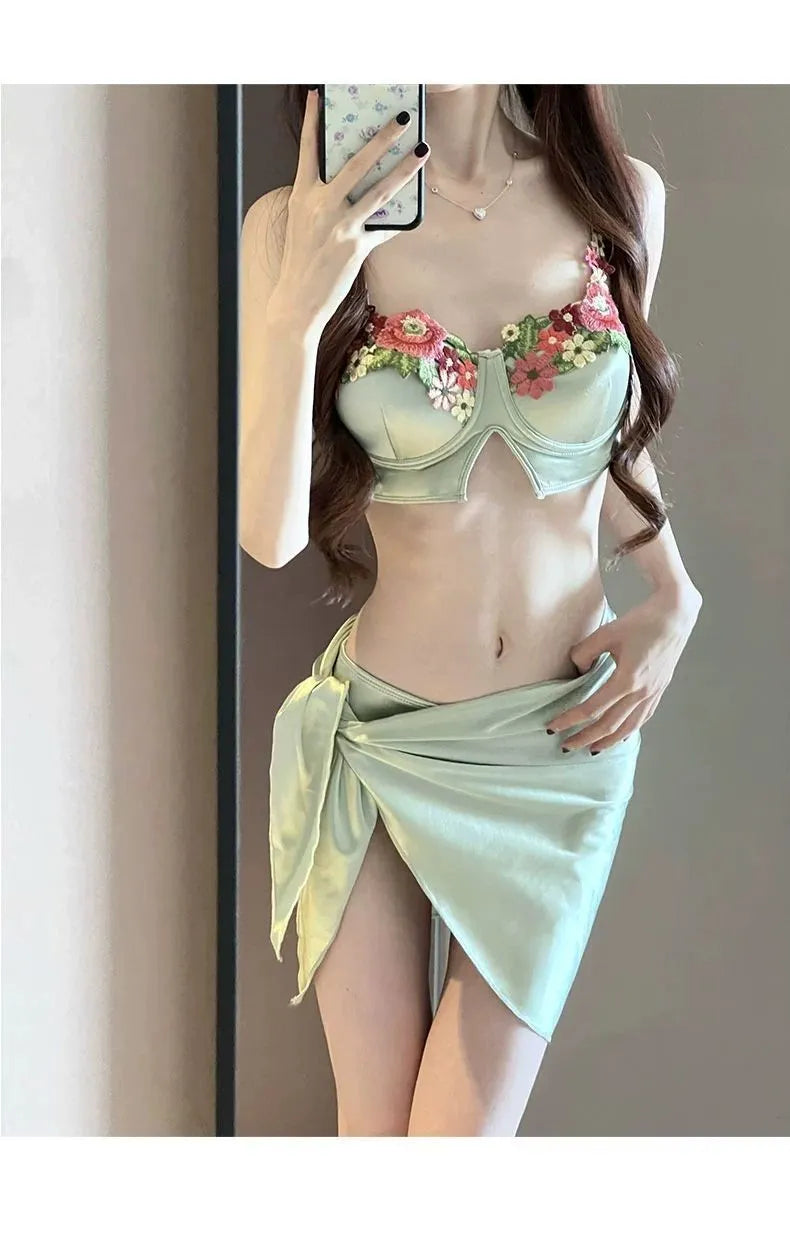 Green women's triangle bikini three-piece swimsuit set with matching skirt