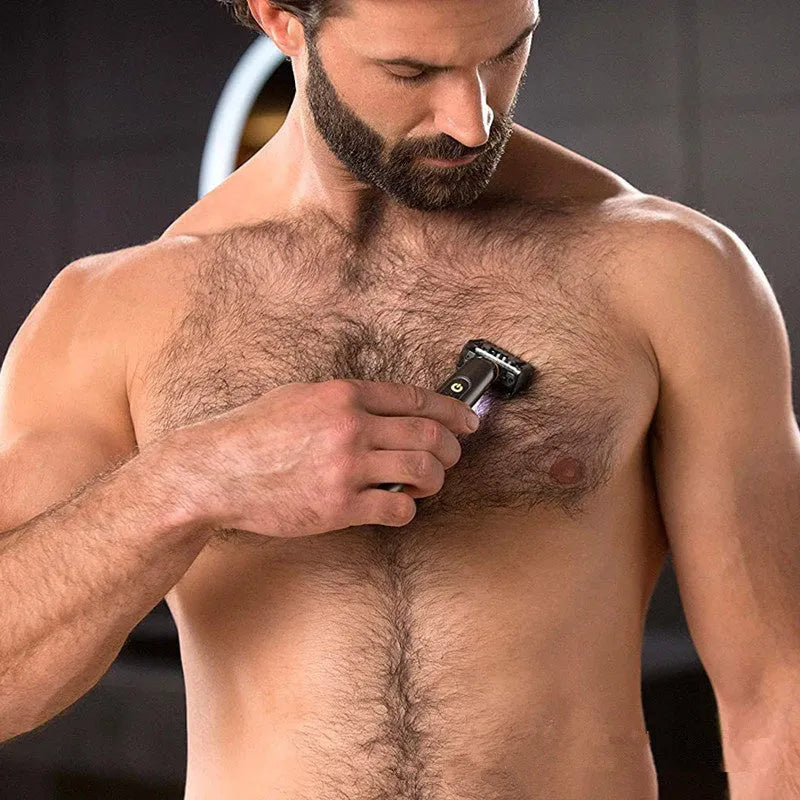 Black wireless rechargeable precision shaver with stainless steel blades, measuring 15cm long with ergonomic handle