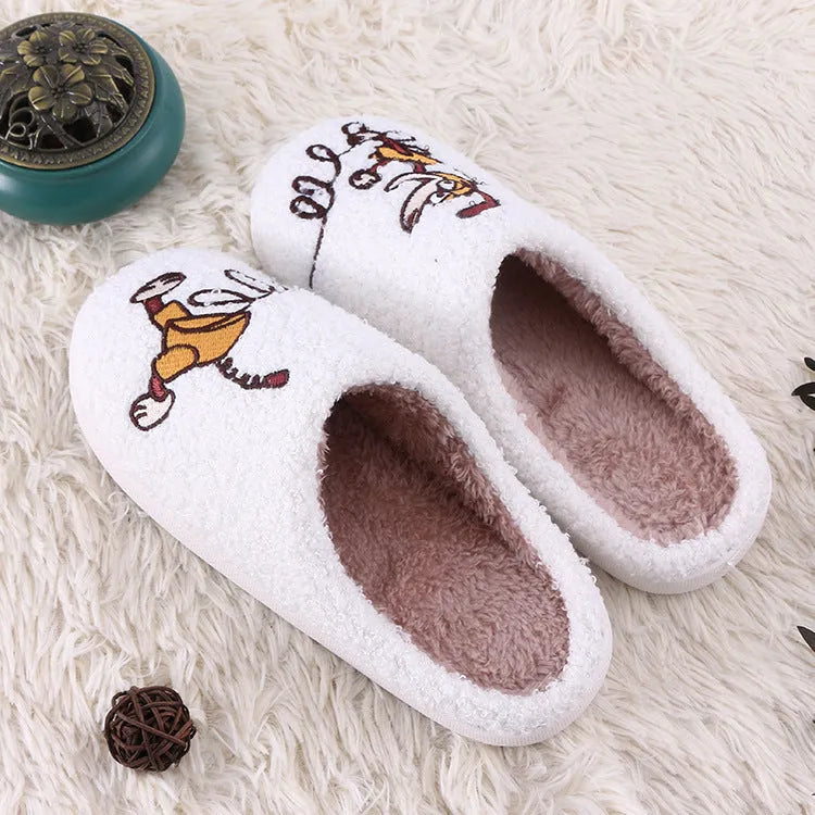 White fluffy cartoon slippers with a plush upper and a non-slip rubber sole.