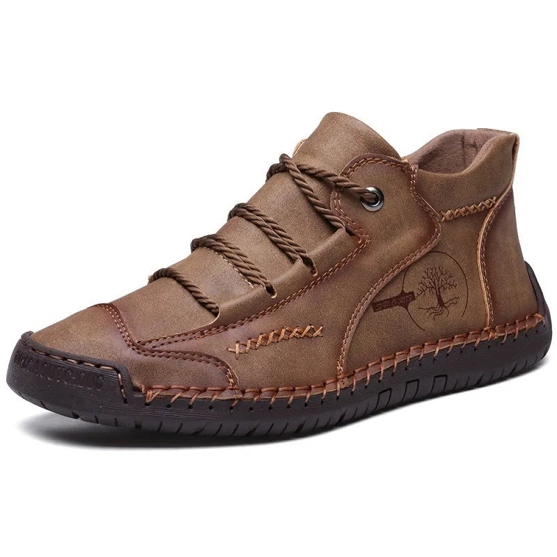 Men's leather mid-top work boots in various colours with lace-up front and rubber sole