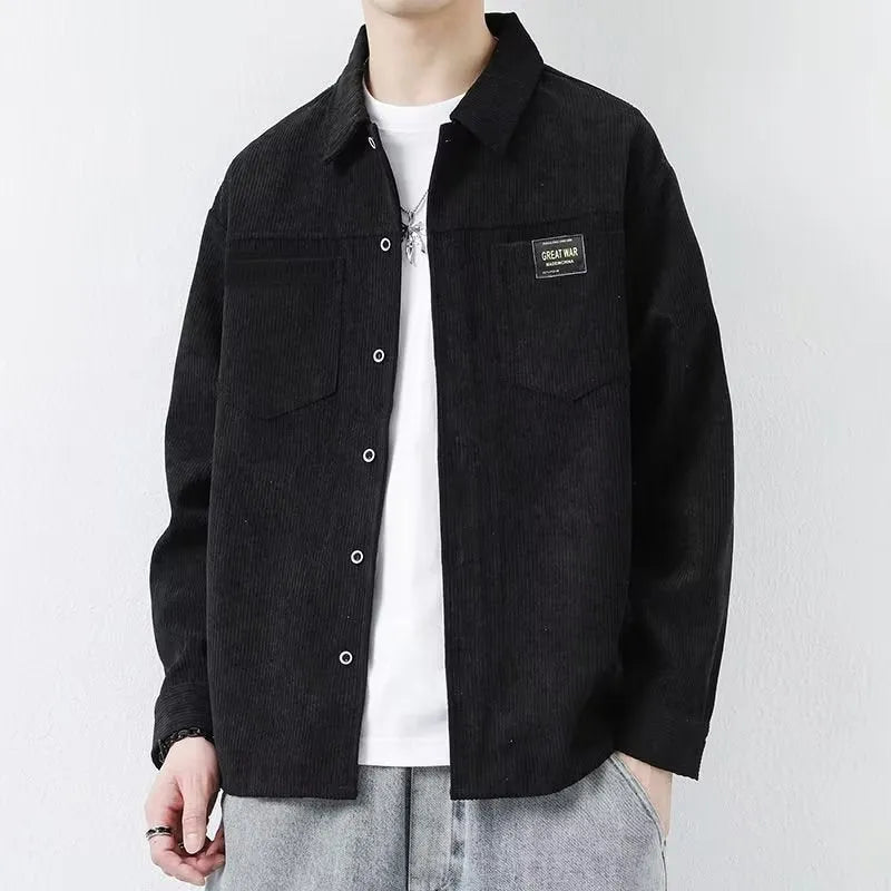 Men's black corduroy cardigan jacket with long sleeves laid flat