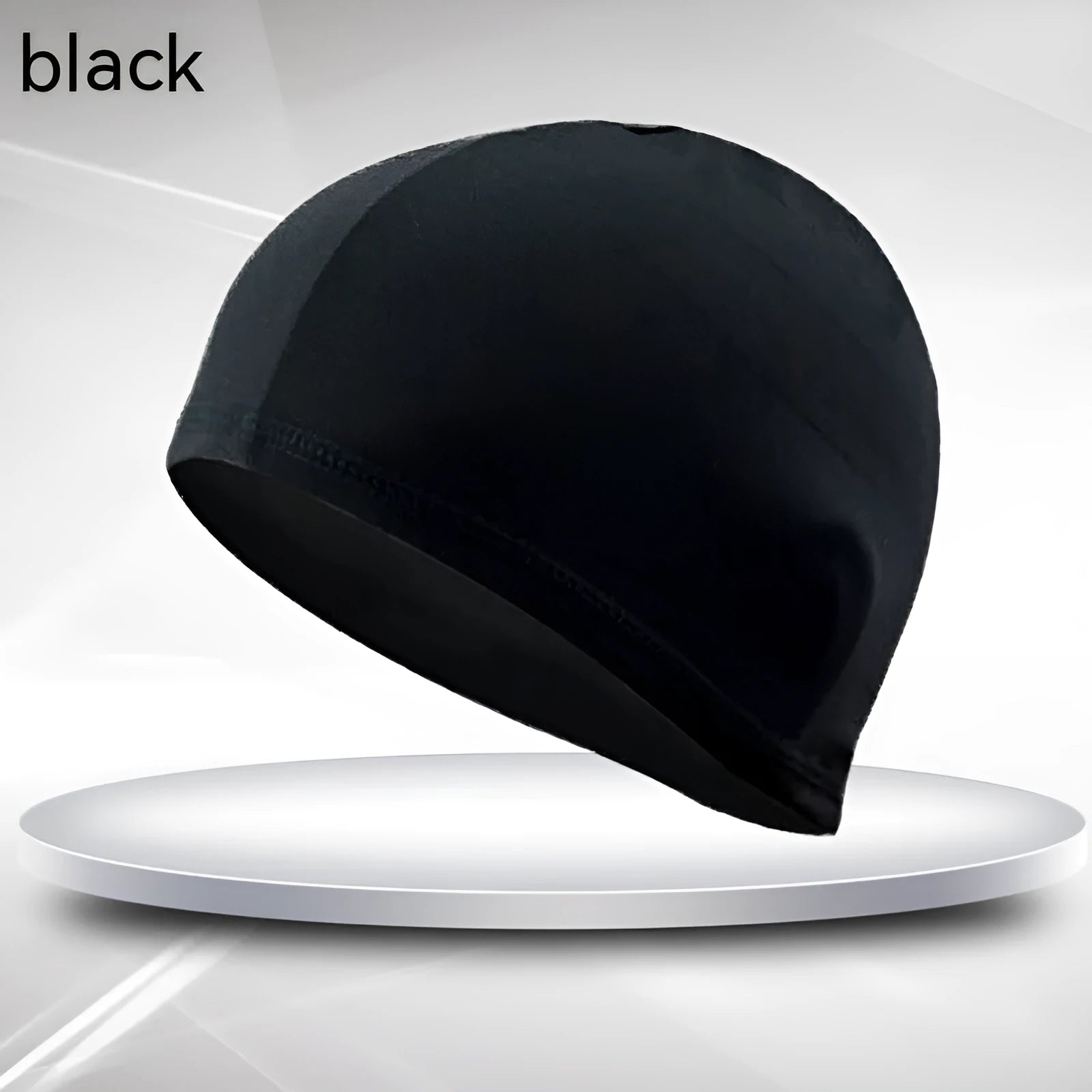 Black unisex adult polyester cloth swimming cap laid flat.