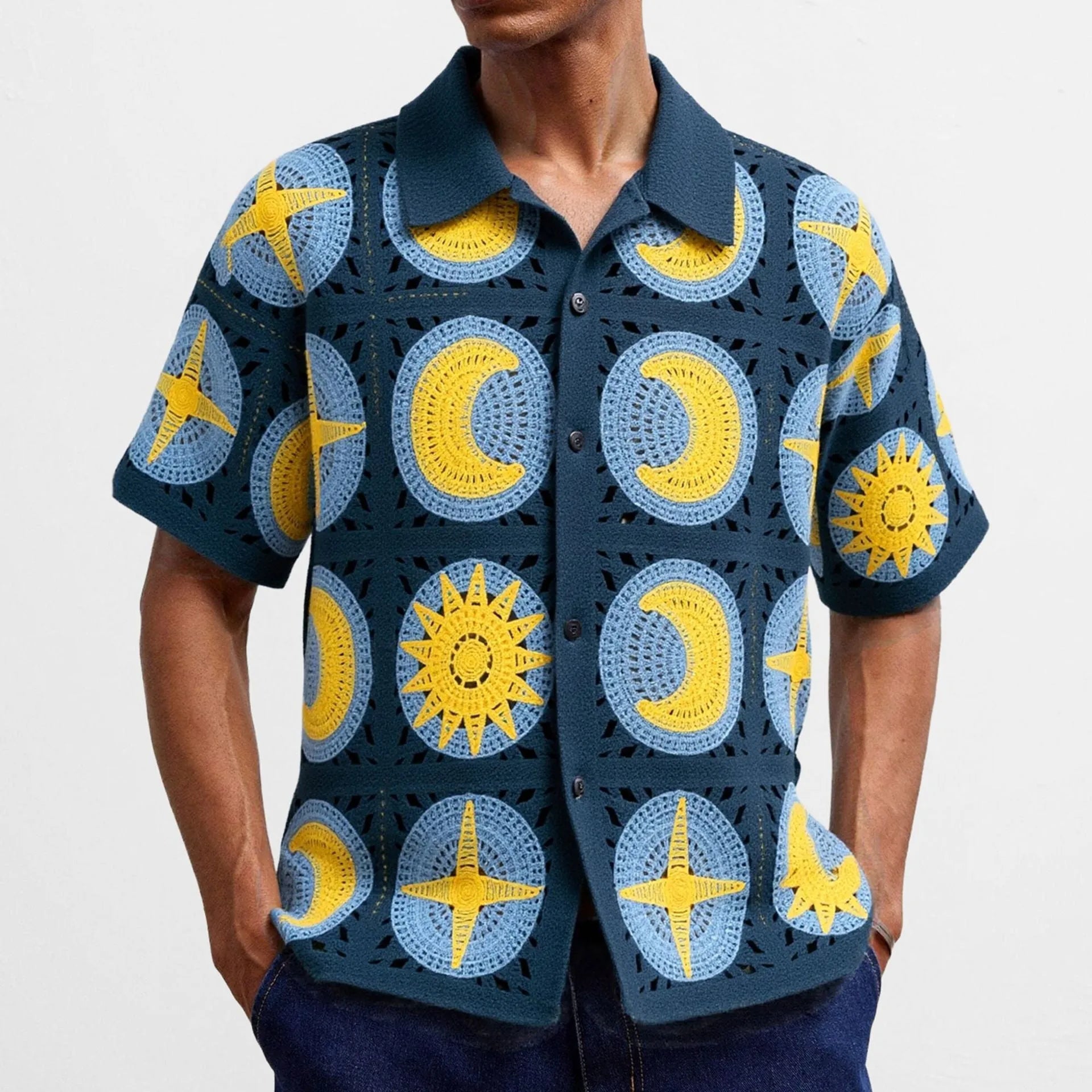 Navy blue men's short-sleeved cardigan with a cartoon flocking pattern, shown laid flat.