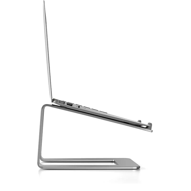 Aluminium alloy laptop stand in black or silver on a desk, showing its raised platform design.