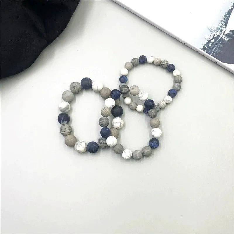 Handmade planet stone bracelet with universe wind pattern showing U-shaped design