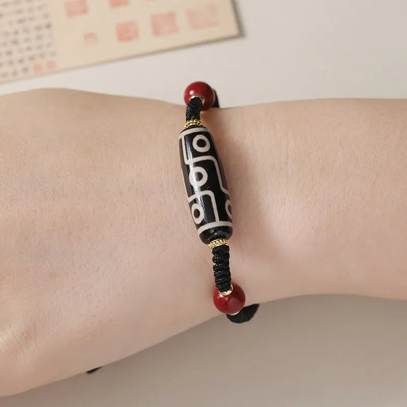 Tibetan agate dzi bead bracelet with stainless steel adjustable clasp showing 30 models of beads