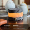 Small orange volcanic rock USB night lamp with touch dimming and essential oil diffuser.