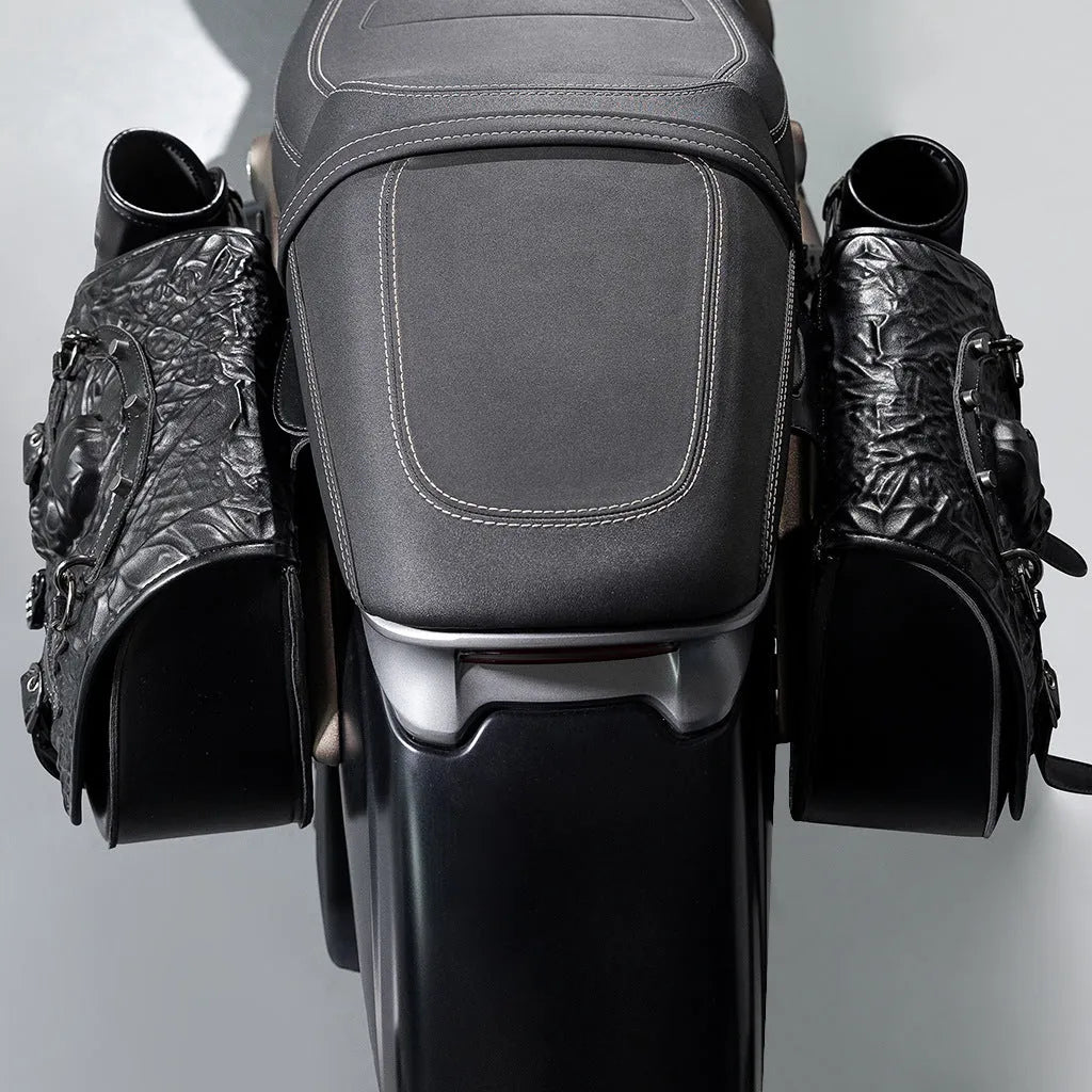 A pair of black PU motorcycle side bags with mounting hardware for luggage storage.