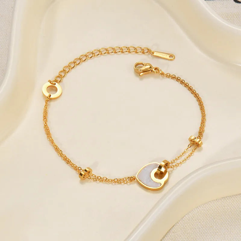 Women's stainless steel resin bracelet with double-layered loving heart design and electroplated finish