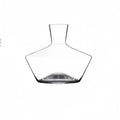 Clear glass wine decanter with removable interior divider shown on a table
