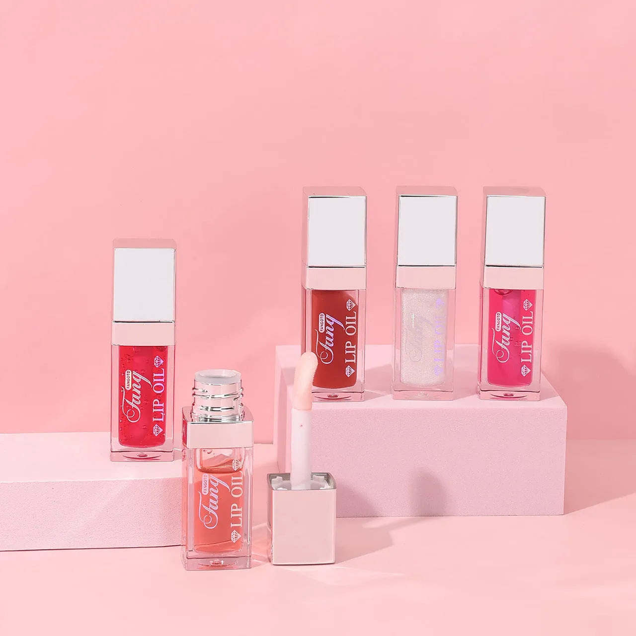 Bright hydrating mint lip gloss in five colour shades with lip essence oil