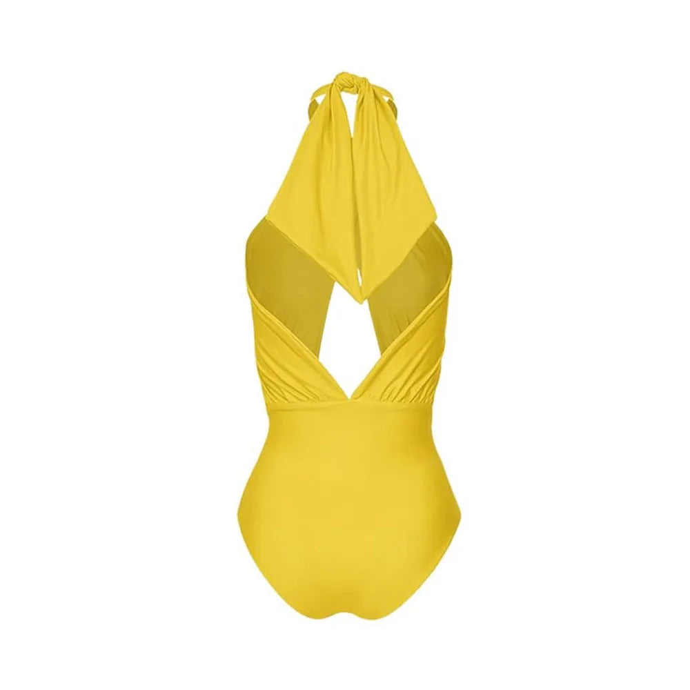 Women's solid colour halter one-piece swimsuit with matching wrap skirt set on a mannequin.