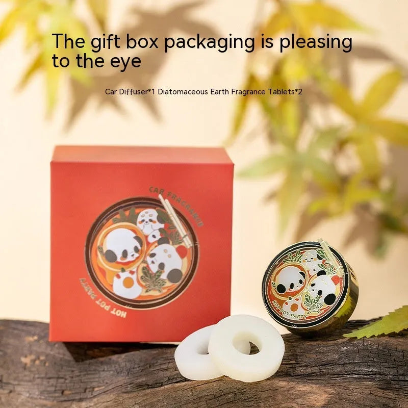 Panda hot pot shaped car air freshener diffuser mounted on a car vent with diatomaceous earth fragrance tablets