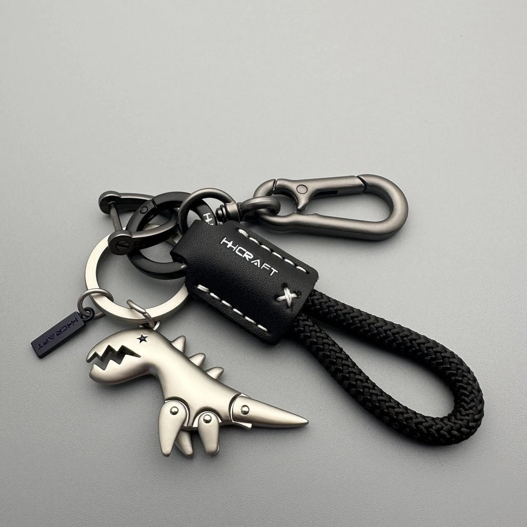Cartoon little dinosaur keychain in zinc alloy, a schoolbag pendant in one of eight styles
