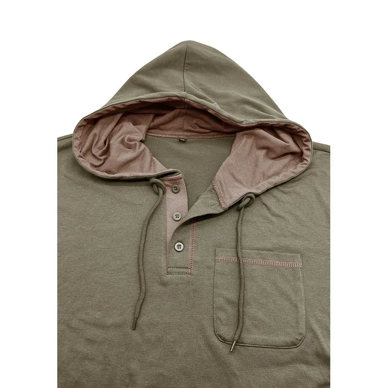 Men's black cotton blend hooded Henley shirt with long sleeves on a hanger