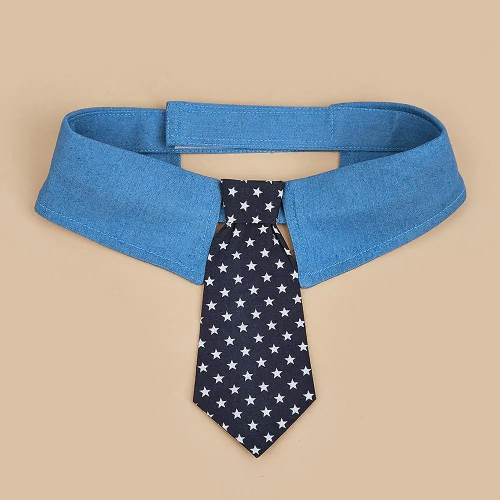 Blue denim dog collar with an adjustable fastener and a choice of bow tie or necktie in a star pattern.