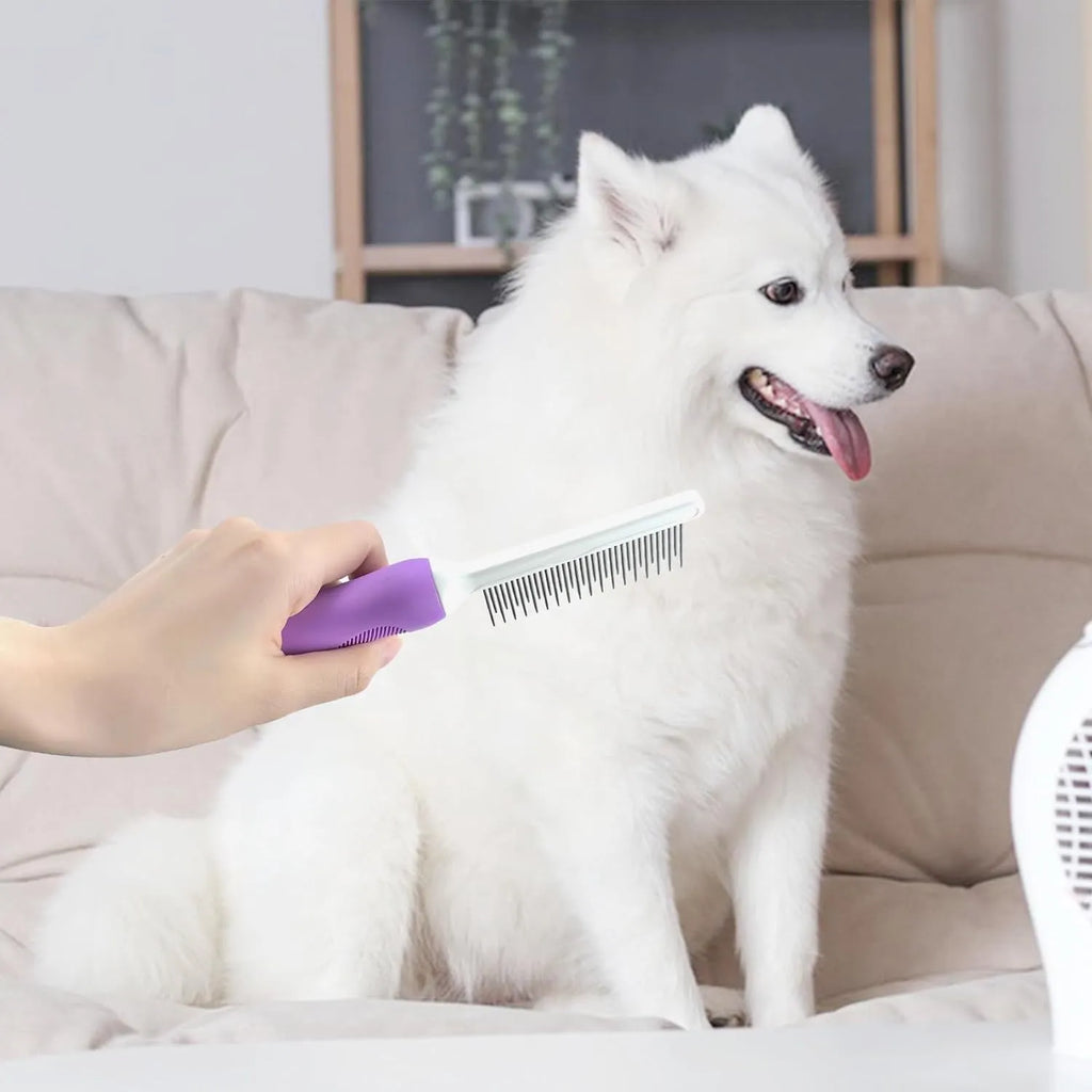Purple detangling pet comb with stainless steel teeth for grooming dogs and cats, showing ergonomic handle
