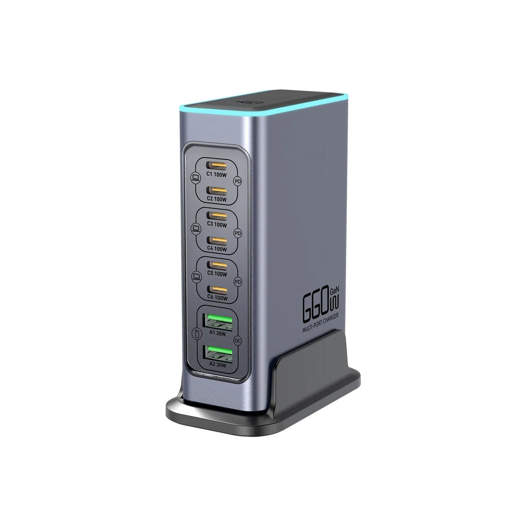 660W GaN desktop charger with five ports and interchangeable plugs for AU, EU, UK, US sockets on a desk