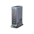 660W GaN desktop charger with five ports and interchangeable plugs for AU, EU, UK, US sockets on a desk