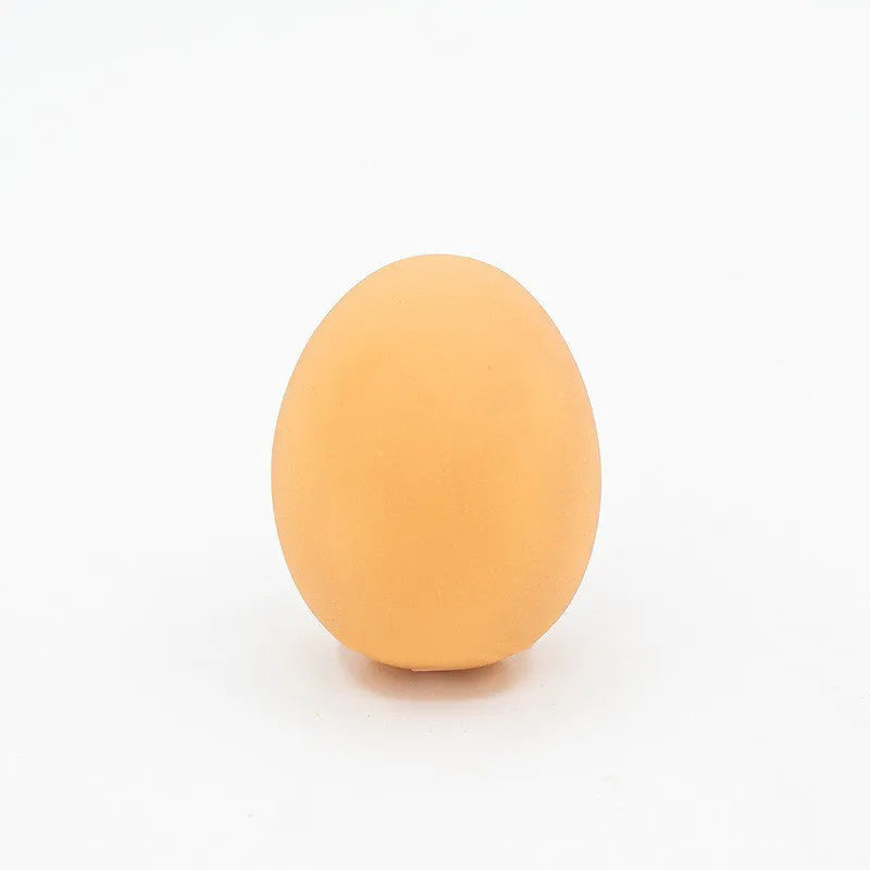 Simulation egg-shaped dog chew toy with squeaker sound for dental play