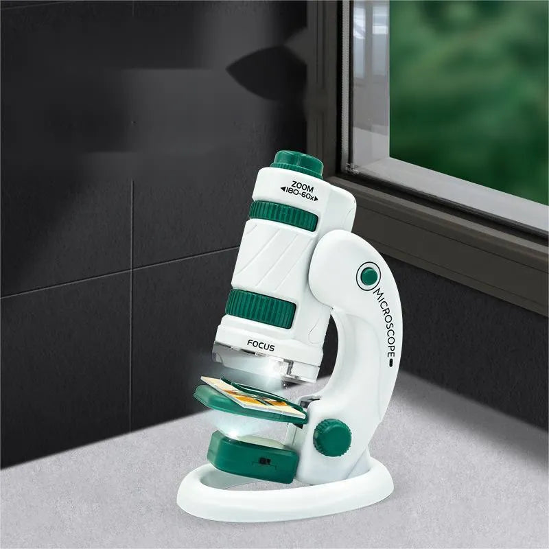 Portable plastic microscope set with specimen slides in white-green and white-black colour options.