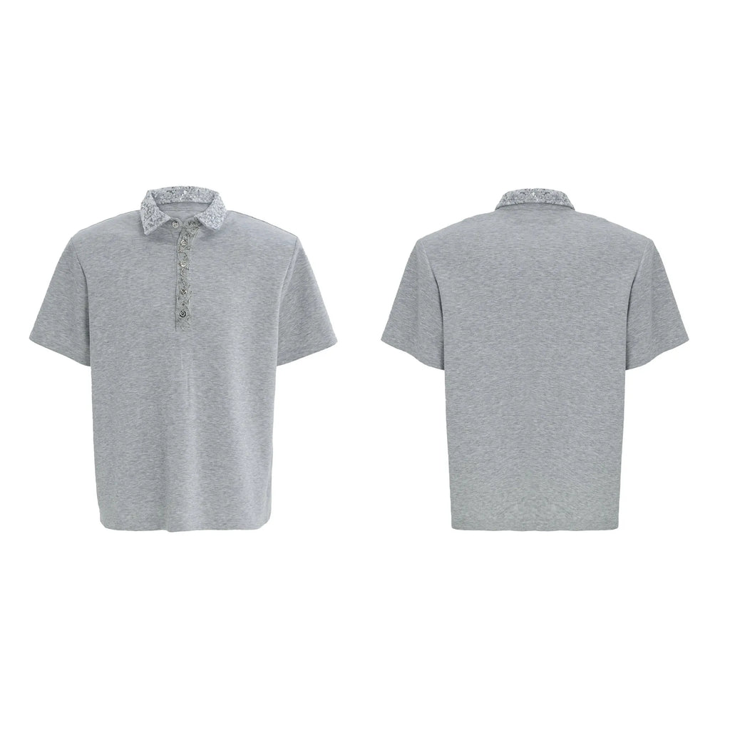 Men's black loose-fit polo shirt with embroidery sequins and square collar, short sleeves, on a hanger