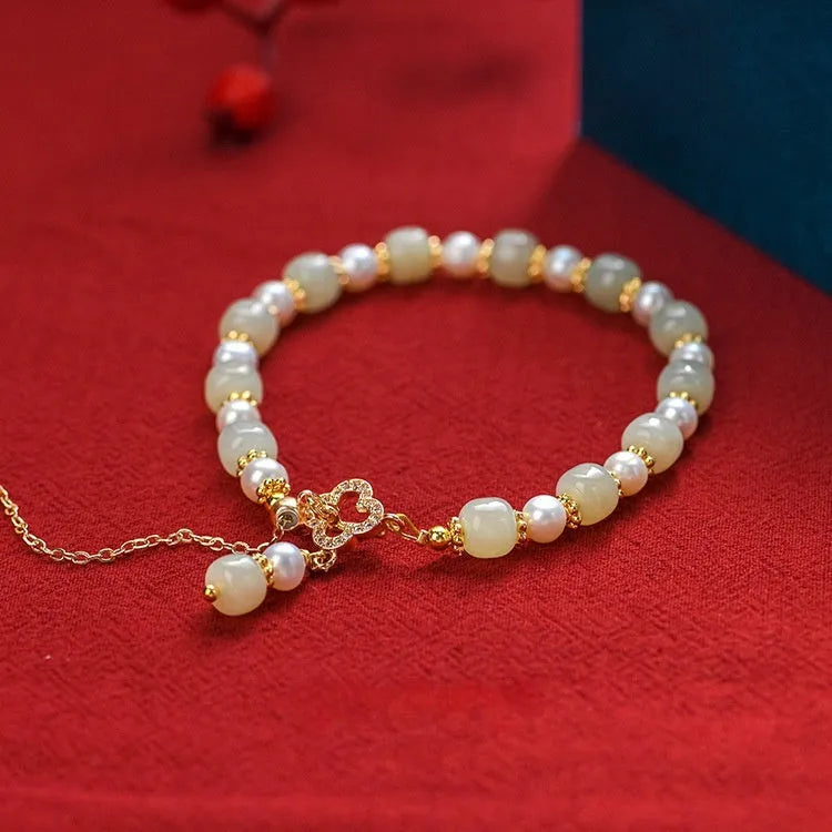 Women's Hetian jade bracelet with round pearl pendant in gold electroplated finish